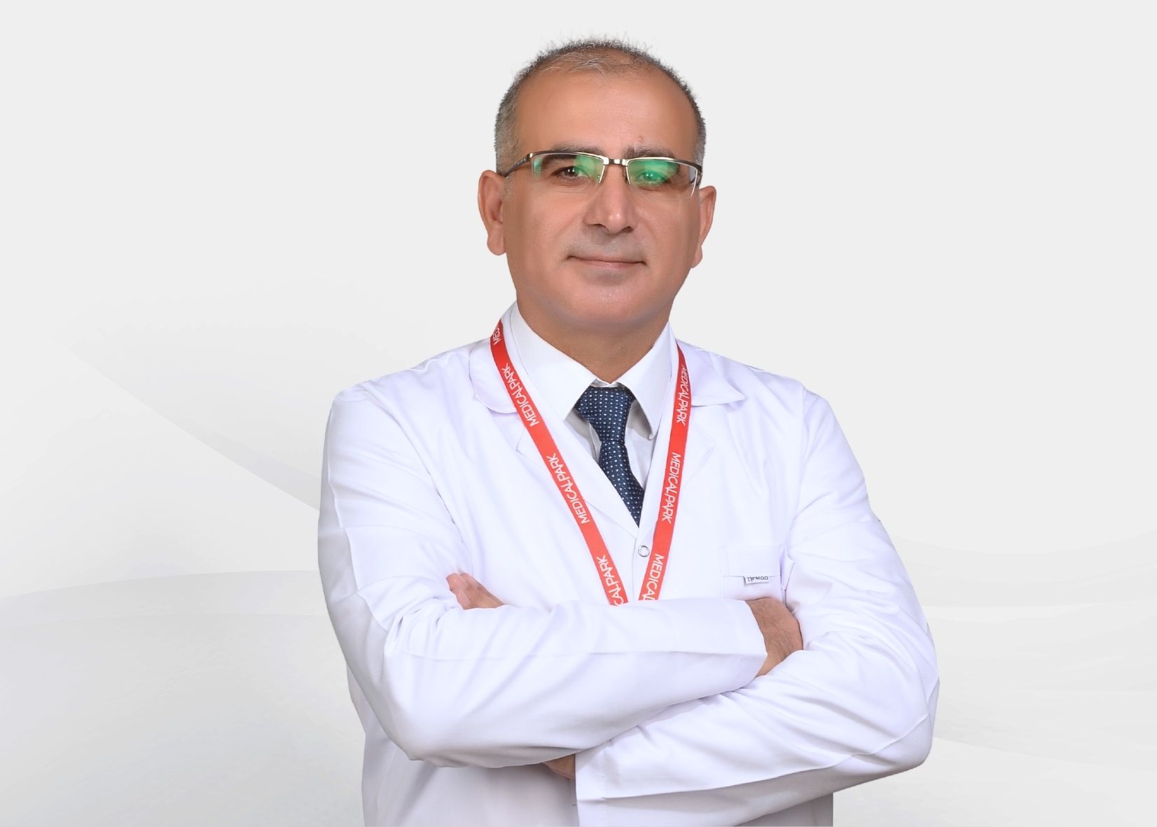 OP.DR. MUCAHİT TAN